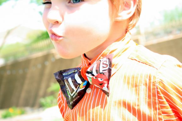 liam wearing candy bowtie for father's day