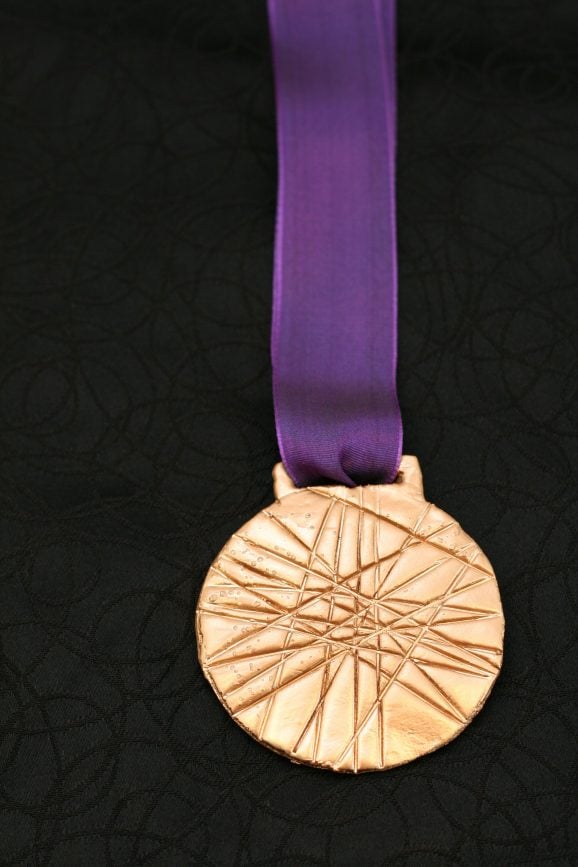 DIY Olympic Gold Medal Craft for kids during the Olympic 2012 London Summer Games #olympics #goldmedal DIY Olympic Gold Medal Craft for kids during the 2012 London Summer Games #olympics #goldmedal