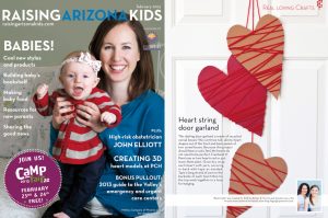 Heart Door Garland from Cereal Boxes and Yarn on PagingSupermom.com #valentines #recycledcraft #kidscraft